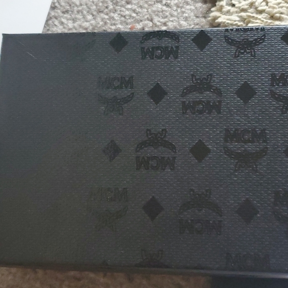 Mcm HOST PICK  zip leather white color wallet new from.mcm lowered today